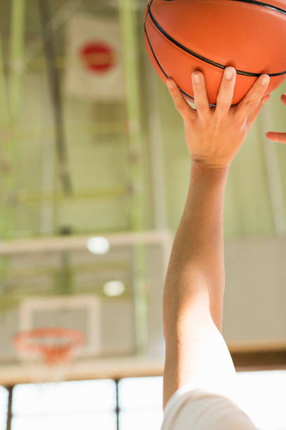 istock Boys playing basketball in the gymnasium. 2157126885