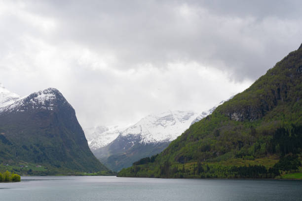 istock Olden - Norway - May 17 - 2023 - River and mountains 2157129097