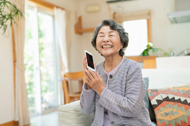 istock Senior woman on videoconference with grandchildren at home. 2157131978