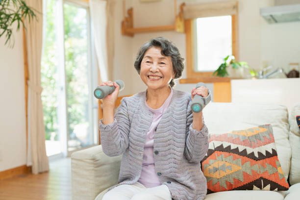 istock Senior women stretching. 2157132034