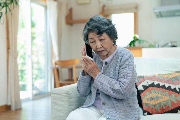 istock Senior woman anxiously making a phone call. 2157132052