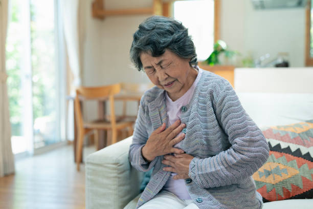 istock Senior women with chest pains. 2157132067
