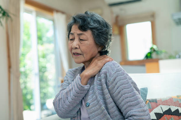 istock Senior women suffering from stiff shoulders. 2157132095