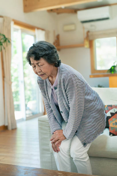 istock Senior women suffering from knee pain. 2157132115