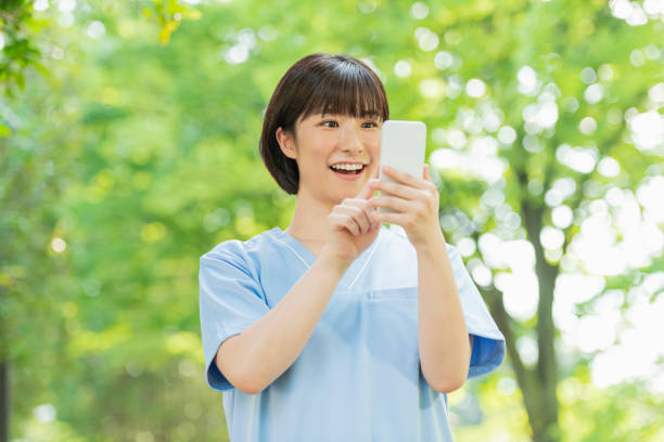 istock Female healthcare professionals using smartphones. 2157134319