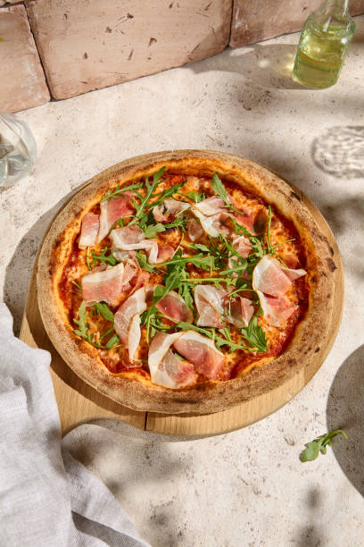 Sunlit Summer Pizza with Parma Ham and Arugula - Fresh and Rustic Italian Delight