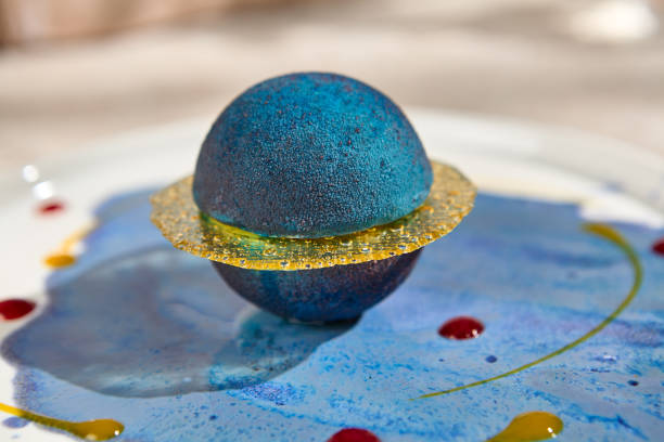 Galaxy-Themed Mousse Pastry in Planet Shape with Summer Sunlight and Shadows