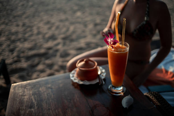 istock mango smoothie in a beautiful glass. sunset. summer.selective focus. low depth of focus. beautiful blurred background 2157136341