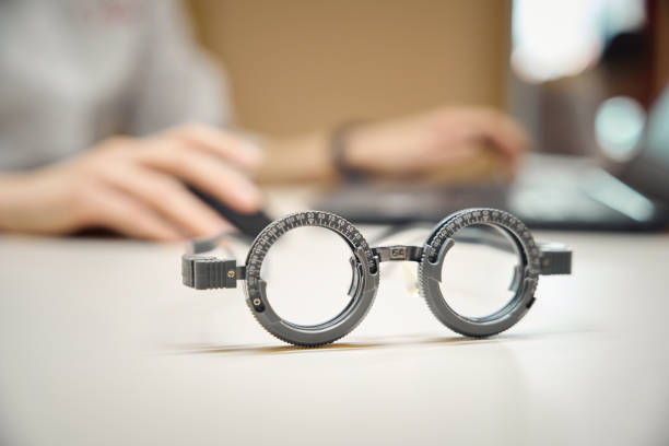 istock Glasses with trial lenses lie on the ophthalmologists desk 2157137834
