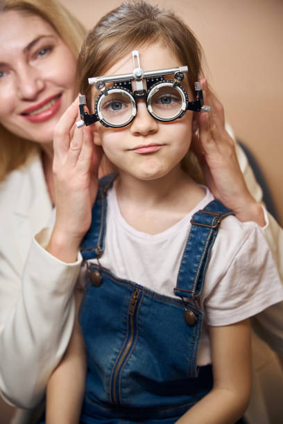 istock Little girl in trial lenses 2157137921