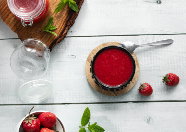 istock Fresh strawberry jam. on a wooden background. berries 2157138286