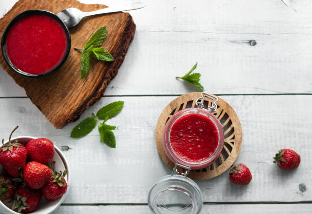 istock Fresh strawberry jam. on a wooden background. berries 2157138304