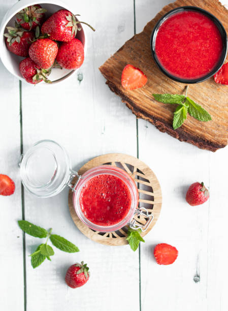 istock Fresh strawberry jam. on a wooden background. berries 2157138322