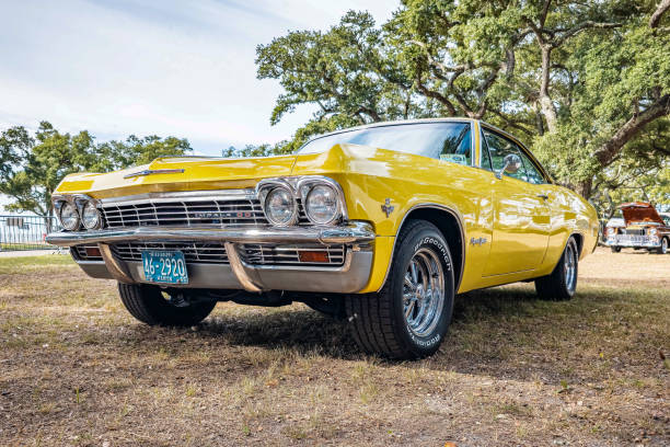 Gulfport, MS - October 07, 2023: Low perspective front corner view of a 1965 Chevrolet Impala SS Hardtop Coupe at a local car show.