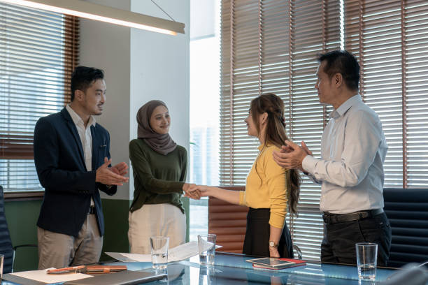 istock Asian business partner meeting congratulate successful projects. 2157140164