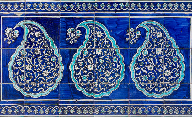 uzbek ceramic tile mosaic with traditional oriental Arabic Islamic pattern decorated with blue and white starry ornament