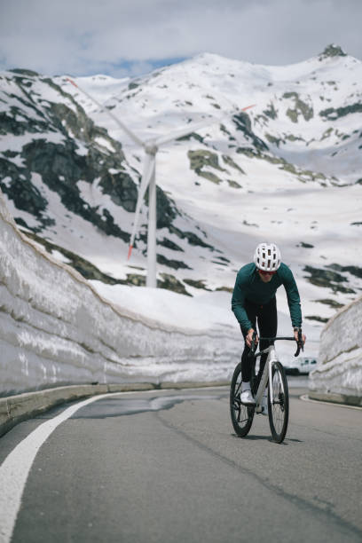 istock Road biker rides up high mountain pass 2157142524