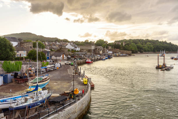 Old fishing harbour along a river at sunset