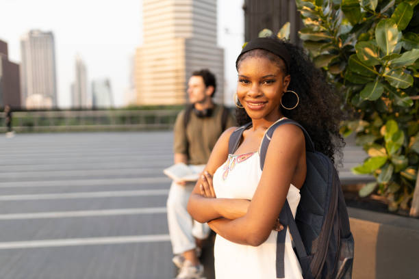istock Attractive young high school student smiling on university campus 2157143038