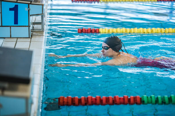 istock Woman at the indoor pool 2157146576