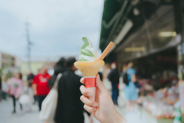 istock A matcha green tea soft serve ice cream cone with a mochi piece on top 2157147596