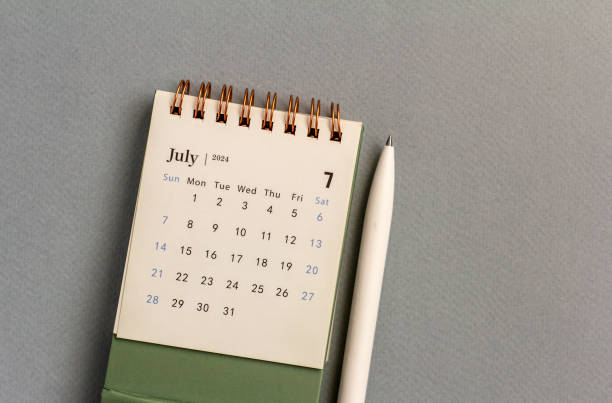 istock July 2024 desk calendar on your desktop for planning. 2157149761