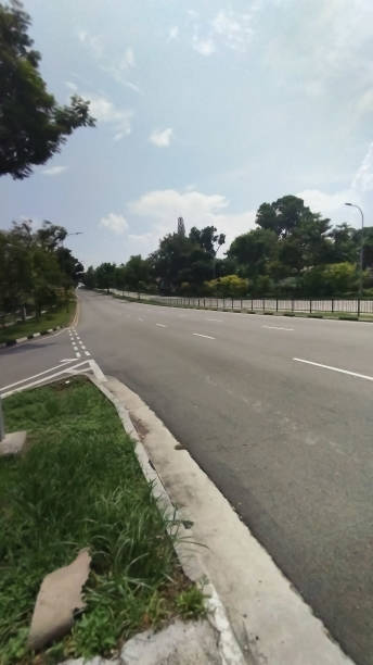 istock an empty asphalt road and slip road beside 2157151677