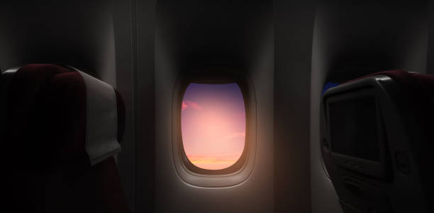 istock Aerial view through airplane window high above orange sunset sky,Inside Passenger plane seat POV looking out at beautiful yellow sunrise cloud,Banner transport for Travel,Business Trip,Holiday Vacation 2157152861