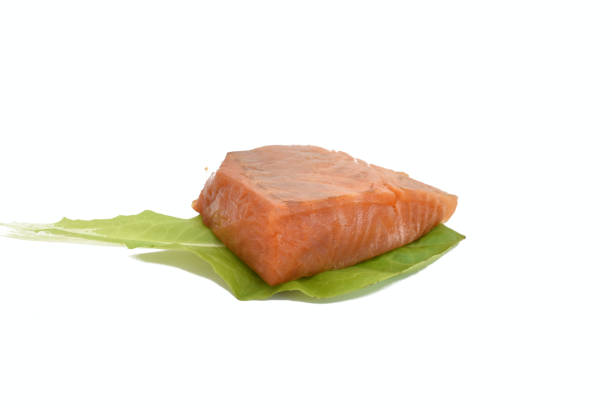 Slices of smoked salmon with capers, onions, and cream cheese