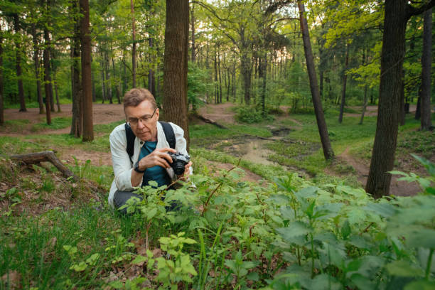 Senior man enjoying his hobbies in nature