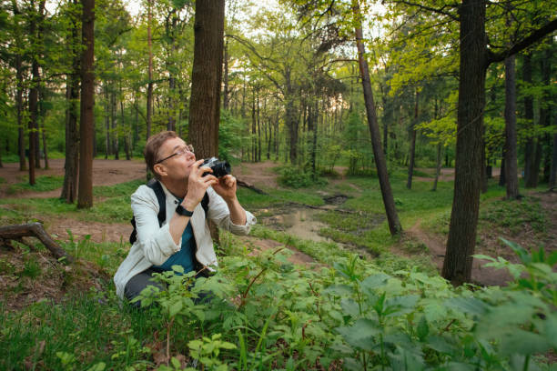 Senior man enjoying his hobbies in nature