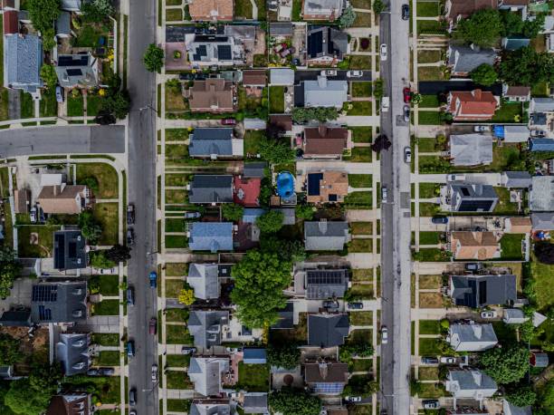 istock Top-down view over a middle-class residential neighborhood on a cloudy day. 2157157546