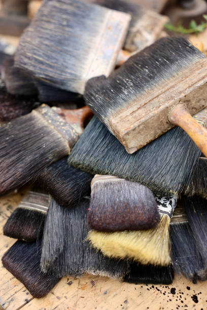 istock Pile of used old paint brushes 2157160062