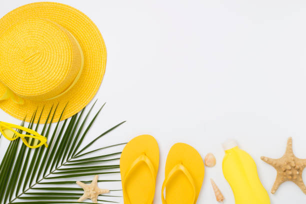 istock Flat lay with yellow summer outfit on color background. Vacation concept 2157163240