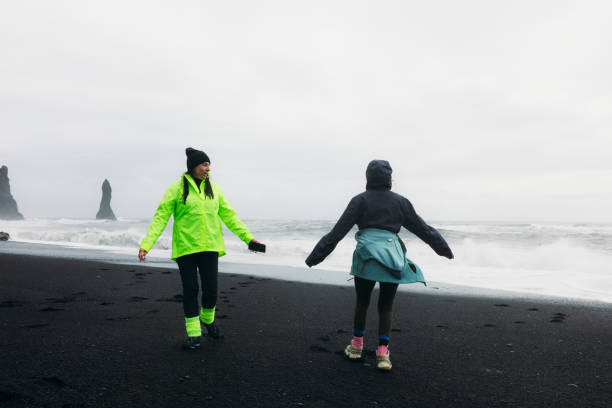 istock Feel Freedom Together at Idyllic Black Sand Beach 2157167002