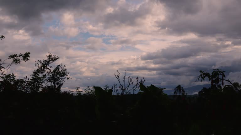 Time-lapse of a two great concentration of dense clouds moving in opposite directions