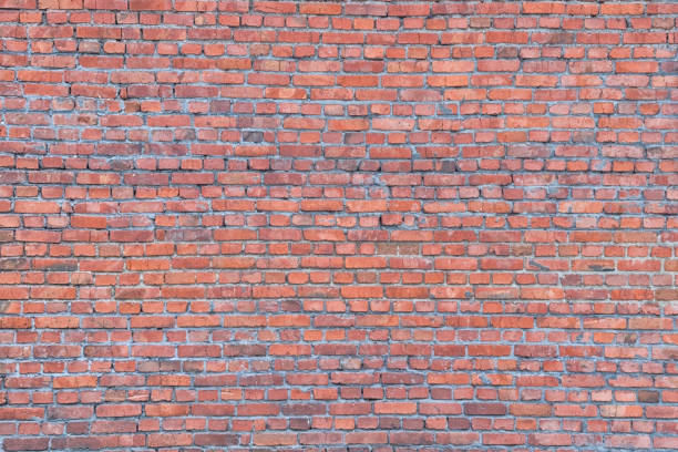 istock Close-up texture of the old red brick wall. Abstract close-up brick wall background. 2157170144