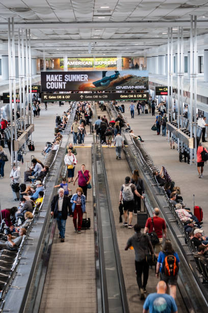 People lined up and waiting in airport.