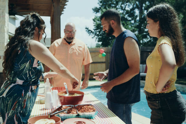 istock Serving Food at a Backyard Family Celebration 2157172188