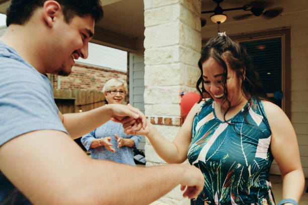 istock Family Celebrating Together at a Summer Backyard Party 2157172309