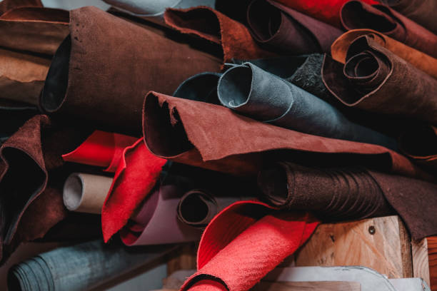 istock Rolls of natural color leather for leather craft Various colored . 2157175720