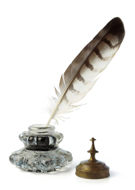 istock Feather with ink bottle. Calligraphy and beautiful vintage handwriting. 2157177457