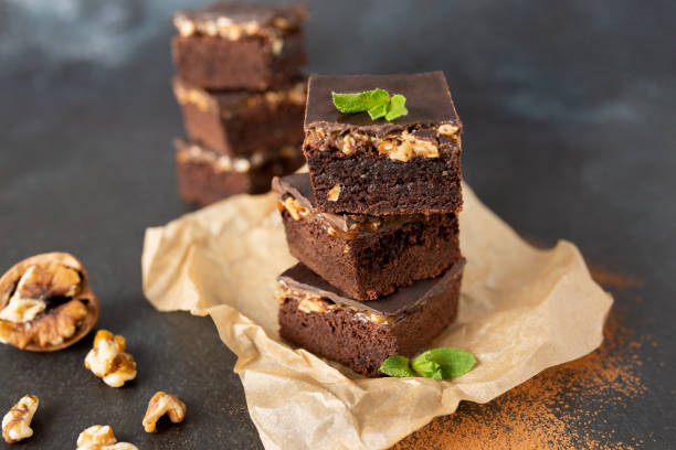 istock Chocolate nut brownie cake decorated with mint. 2157177883