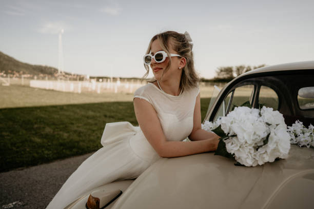Pre-wedding shoot of a bride and groom  with old timer car