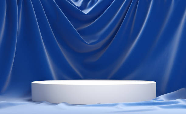 istock Empty podium on blue cloth. Abstract podium for product demonstration. 2157180327