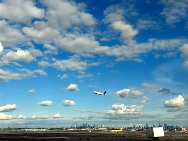 istock Commercial airplane taking off at airport runway 2157180786