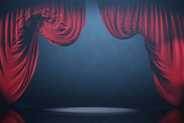 istock Theater stage with smoke. Red curtains in motion. 2157181116