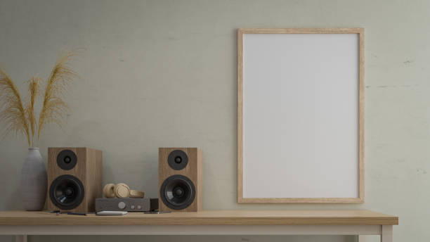 istock picture frame mockup with audio bookshelf speaker. 3d rendering 2157181119
