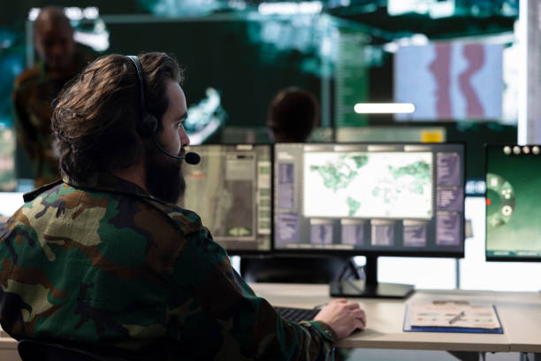 istock Military personnel operating on CCTV reconnaissance system in command post 2157183350