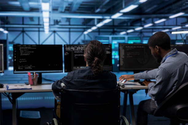 istock Person with paraplegia working in inclusive data center workplace 2157183410